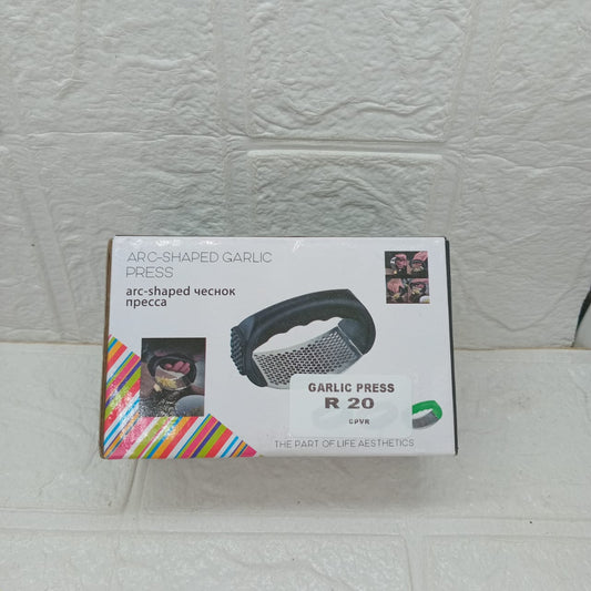 ARC SHAPED GARLIC PRESS
